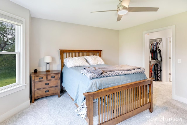 158 Brewer Park Cir, Grand Rapids, MI 49548 - bedroom featuring carpet floors, a walk in closet, a closet, and ceiling fan
