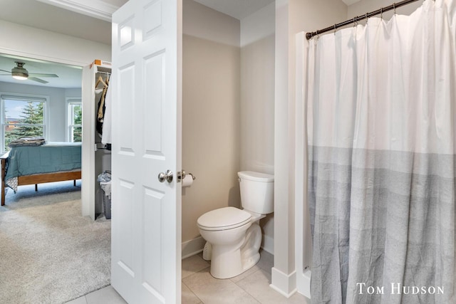 158 Brewer Park Cir, Grand Rapids, MI 49548 - full bathroom featuring toilet, a ceiling fan, baseboards, and a shower with shower curtain