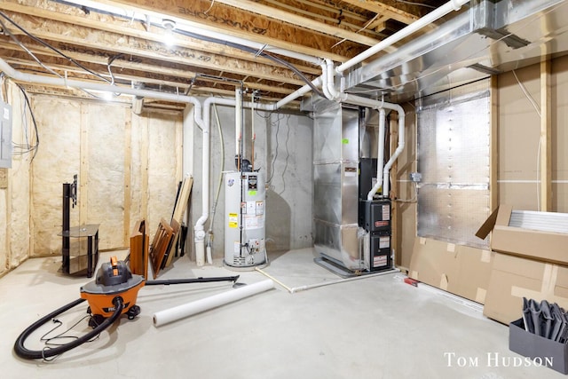 158 Brewer Park Cir, Grand Rapids, MI 49548 - unfinished basement featuring gas water heater, heating unit, and electric panel