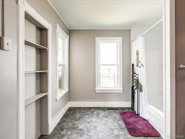 718 Superior St, Port Huron, MI 48060 - bathroom featuring shower / tub combo and crown molding
