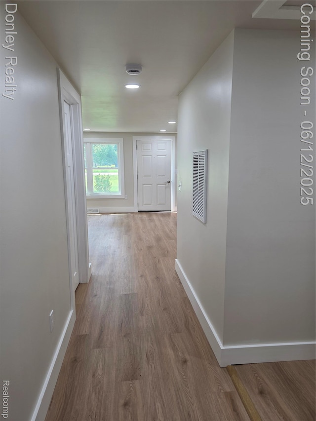 4514 Sebewaing Rd, Owendale, MI 48754 - corridor with baseboards, wood finished floors, and recessed lighting
