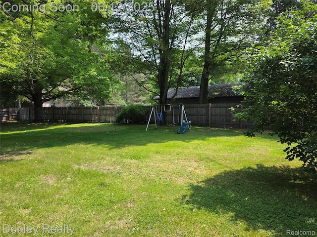 4514 Sebewaing Rd, Owendale, MI 48754 - view of yard with a playground