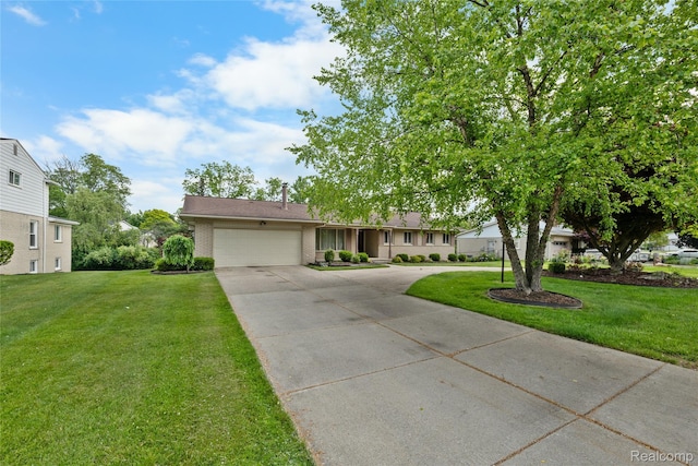 22840 Twyckingham Way, Addison, MI 48034 - view of front facade featuring an attached garage, concrete driveway, a front lawn, and brick siding