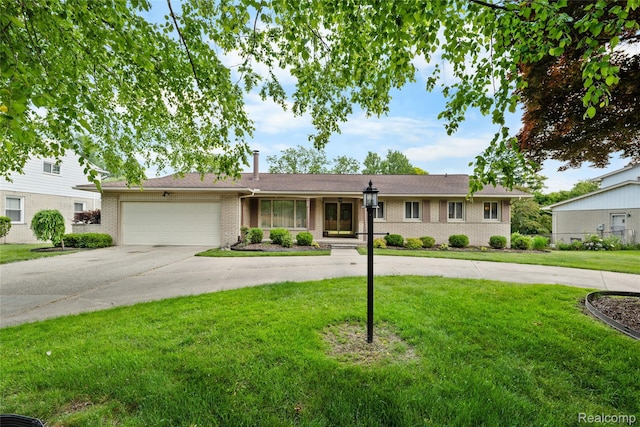 22840 Twyckingham Way, Addison, MI 48034 - view of front of property with driveway, a garage, a front lawn, and brick siding