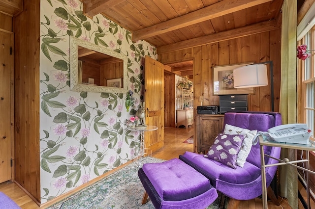 987 Wagner Dr, Battle Creek, MI 49017 - living area featuring wooden ceiling with exposed beams, light wood finished floors, wood walls, and wallpapered walls