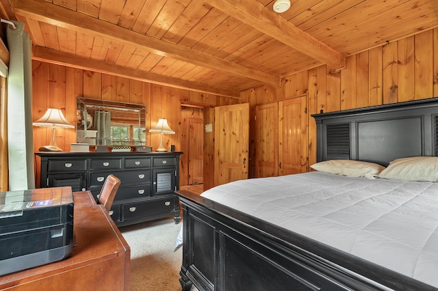 987 Wagner Dr, Battle Creek, MI 49017 - bedroom with light carpet, wood ceiling with exposed beams, and wood walls