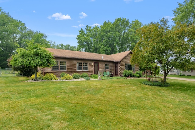 987 Wagner Dr, Battle Creek, MI 49017 - cabin with log siding