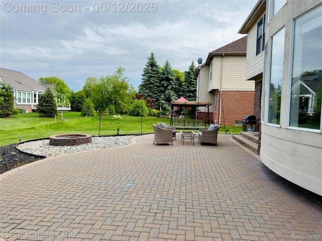 6038 Mayapple Dr, Troy, MI 48085 - view of patio featuring an outdoor living space with a fire pit and grilling area