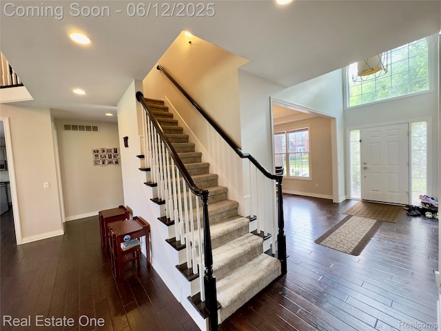 6038 Mayapple Dr, Troy, MI 48085 - entryway with stairway, dark wood finished floors, healthy amount of natural light, baseboards, and recessed lighting