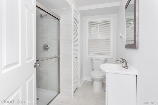 225 Euclid St, Mount Clemens, MI 48043 - bathroom featuring toilet, a shower stall, vanity, and a closet