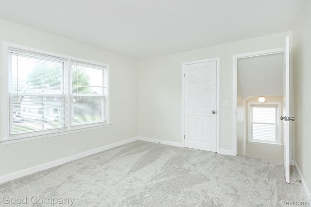 225 Euclid St, Mount Clemens, MI 48043 - carpeted empty room featuring baseboards