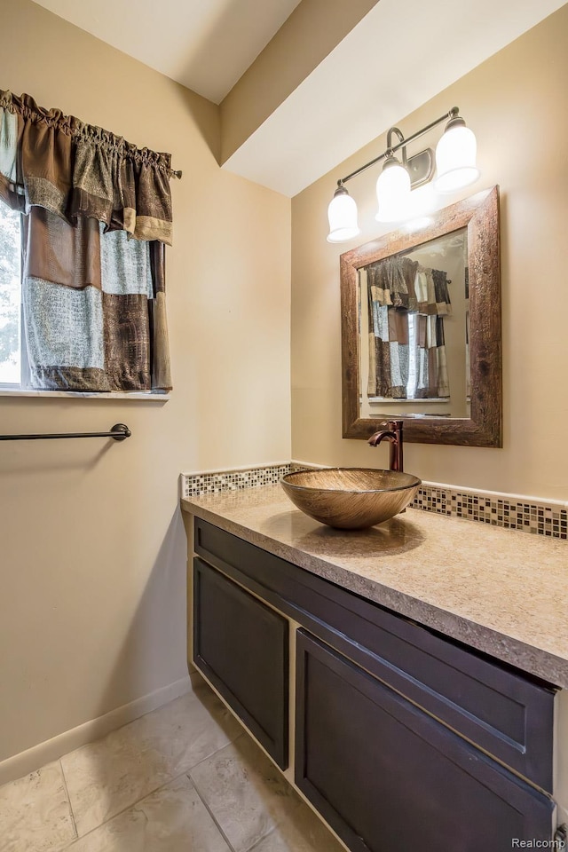 1231 Duckwood Ct, White Lake, MI 48383 - bathroom with vanity and tile patterned flooring