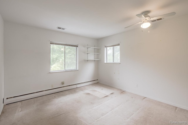1231 Duckwood Ct, White Lake, MI 48383 - carpeted spare room with baseboard heating and a ceiling fan