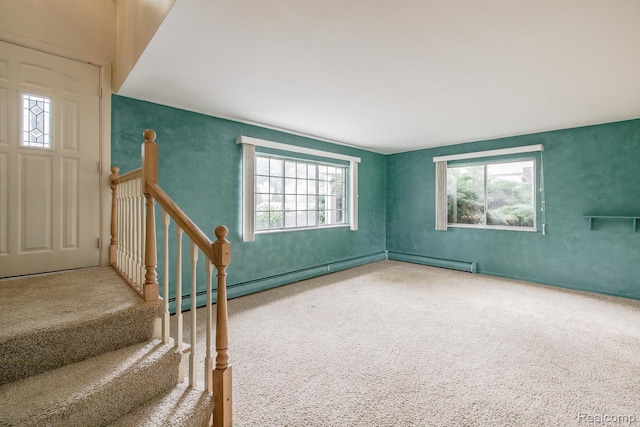 1231 Duckwood Ct, White Lake, MI 48383 - entryway featuring carpet flooring and a baseboard radiator
