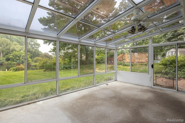 1231 Duckwood Ct, White Lake, MI 48383 - unfurnished sunroom featuring a water view and ceiling fan
