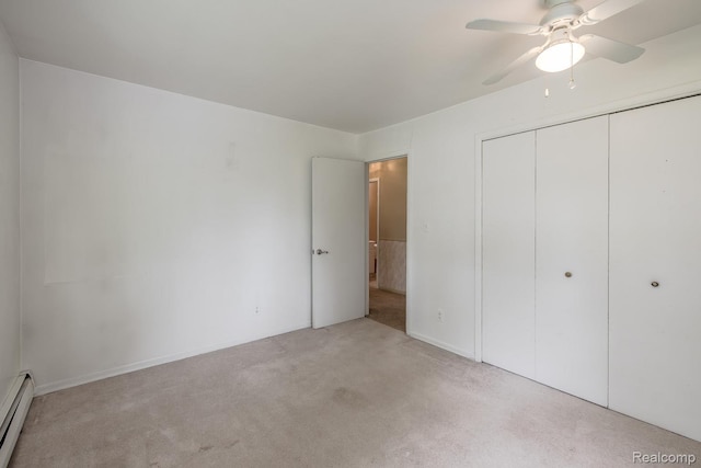 1231 Duckwood Ct, White Lake, MI 48383 - unfurnished bedroom featuring light carpet, a baseboard heating unit, a closet, and ceiling fan
