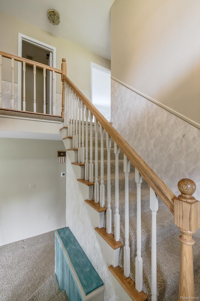 1231 Duckwood Ct, White Lake, MI 48383 - stairway featuring carpet floors