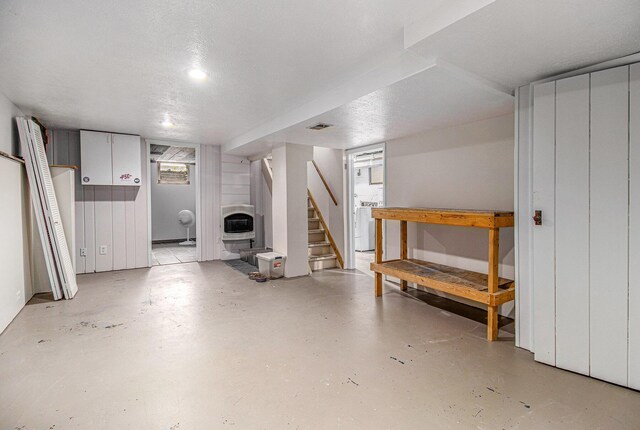 512 Clark St, Big Rapids, MI 49307 - below grade area featuring heating unit and stairs