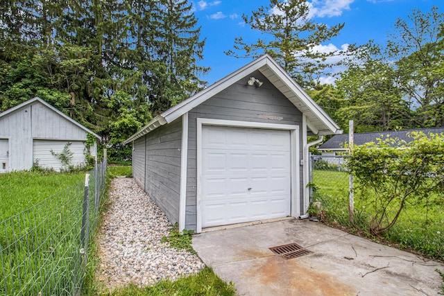 512 Clark St, Big Rapids, MI 49307 - detached garage featuring driveway