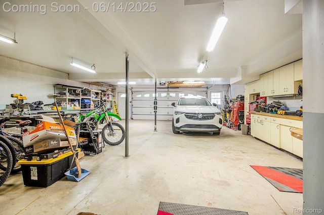 61995 Mount Vernon Rd, Washington, MI 48094 - garage featuring a workshop area