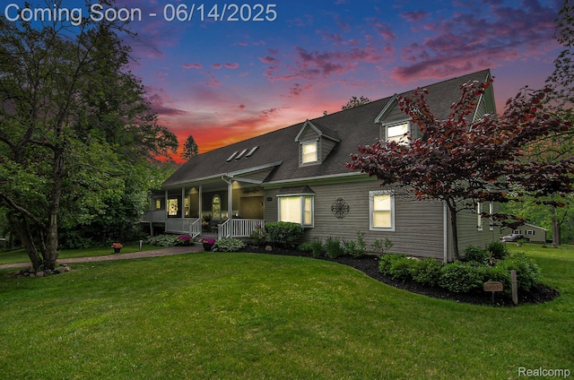 61995 Mount Vernon Rd, Washington, MI 48094 - new england style home with covered porch, a yard, and roof with shingles