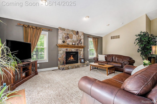 61995 Mount Vernon Rd, Washington, MI 48094 - living room featuring carpet, healthy amount of natural light, a stone fireplace, and vaulted ceiling