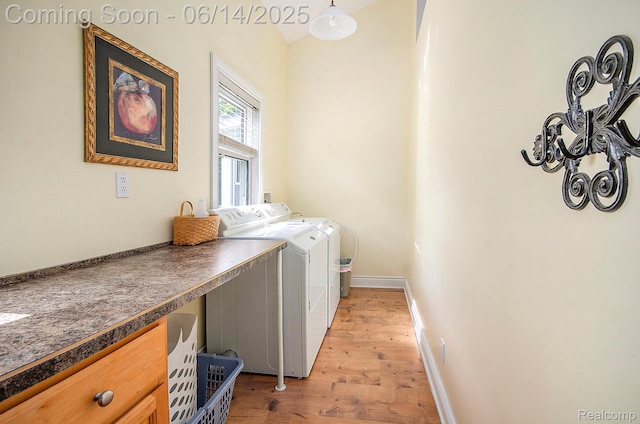 61995 Mount Vernon Rd, Washington, MI 48094 - washroom with independent washer and dryer and light wood finished floors