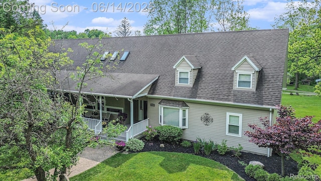 61995 Mount Vernon Rd, Washington, MI 48094 - cape cod home with a porch, a front yard, and a shingled roof