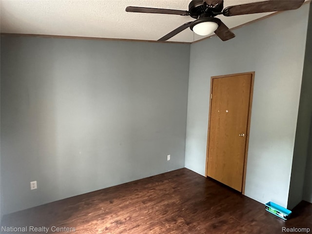5150 Lafave Rd, Black River, MI 48721 - empty room featuring dark wood-style floors, ceiling fan, and a textured ceiling