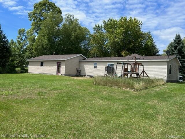 5150 Lafave Rd, Black River, MI 48721 - back of house with a yard