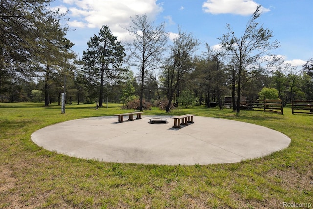 2536 Meridian Rd, Lewiston, MI 49756 - view of community featuring a fire pit and view of scattered trees