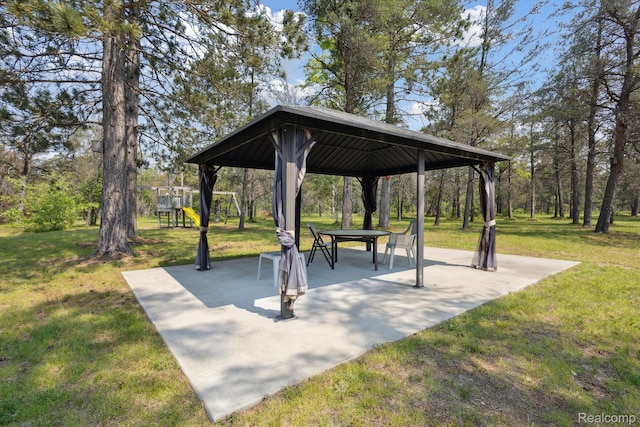 2536 Meridian Rd, Lewiston, MI 49756 - view of community featuring a gazebo, a lawn, and a patio area