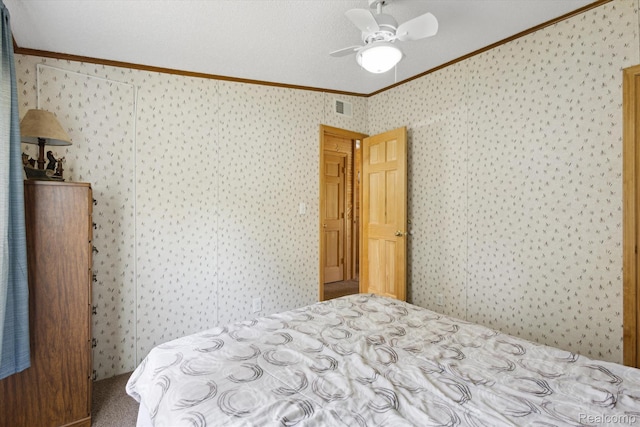 2536 Meridian Rd, Lewiston, MI 49756 - carpeted bedroom with ornamental molding, wallpapered walls, and ceiling fan
