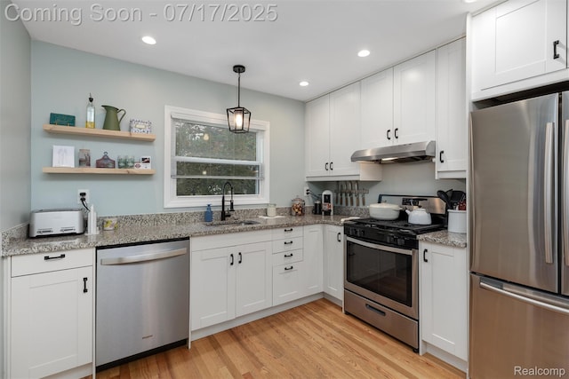 518 Roth Blvd, Clawson, MI 48017 - kitchen with appliances with stainless steel finishes, under cabinet range hood, white cabinetry, light wood finished floors, and recessed lighting