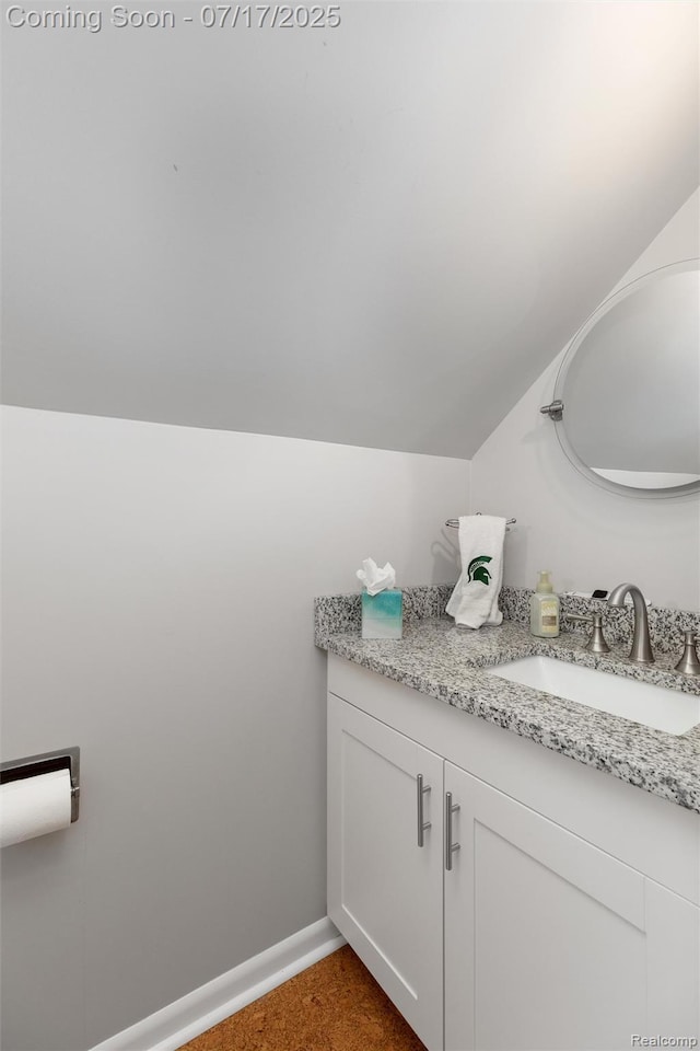 518 Roth Blvd, Clawson, MI 48017 - bathroom with vanity and vaulted ceiling