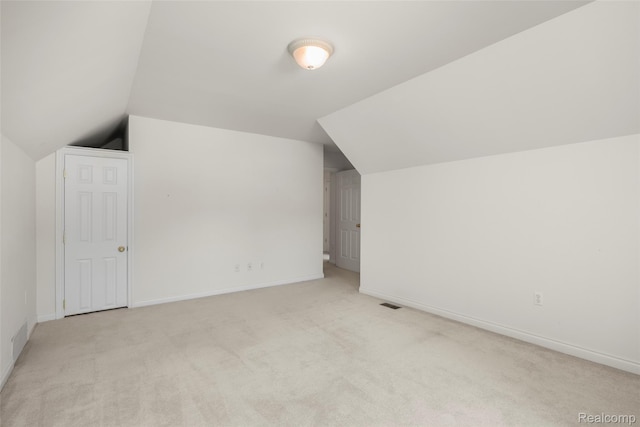 3409 Ancient Dr, Port Huron, MI 48060 - additional living space with lofted ceiling and light carpet