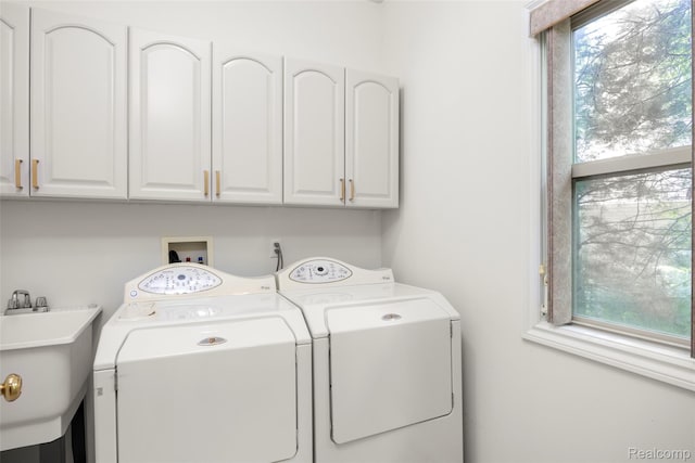3409 Ancient Dr, Port Huron, MI 48060 - washroom with washing machine and dryer and cabinet space
