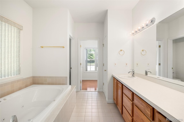 3409 Ancient Dr, Port Huron, MI 48060 - full bathroom featuring a tub with jets, vanity, and tile patterned floors