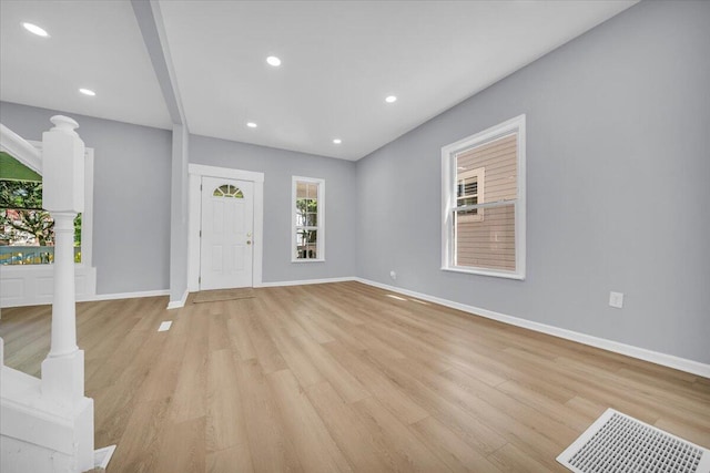 408 Mount Vernon St, Detroit, MI 48202 - foyer with light wood-type flooring, baseboards, ornate columns, and recessed lighting
