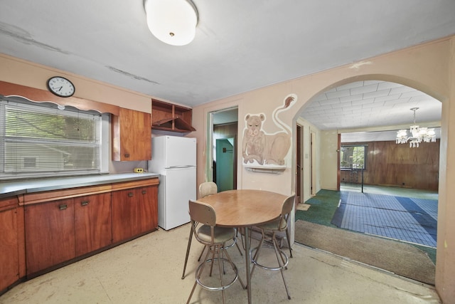 538 S Jackson St, Hanover, MI 49241 - dining space featuring a chandelier and arched walkways