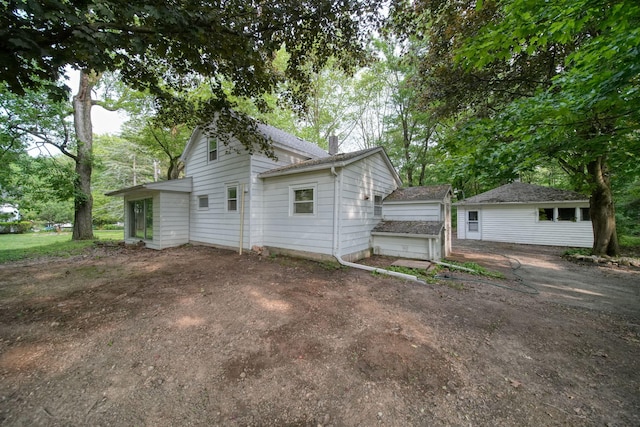 538 S Jackson St, Hanover, MI 49241 - view of home's exterior with a shingled roof