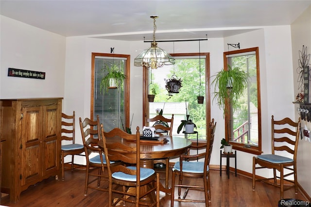 1149 Highview Dr, Lapeer, MI 48446 - dining room featuring a chandelier, hardwood / wood-style flooring, and baseboards