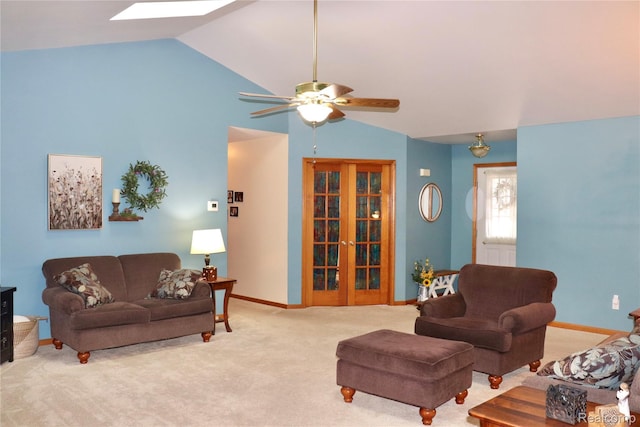 1149 Highview Dr, Lapeer, MI 48446 - living room with lofted ceiling, a ceiling fan, carpet floors, baseboards, and french doors
