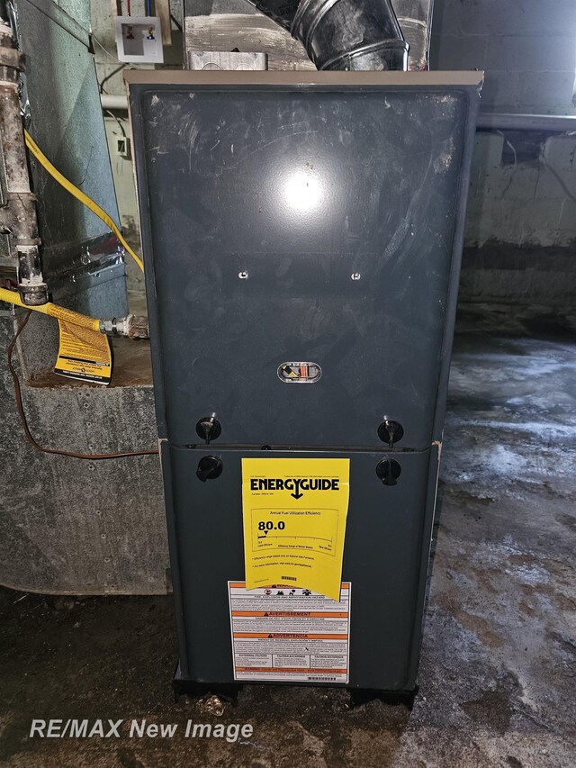 3705 Gratiot Ave, Flint, MI 48503 - utility room featuring heating unit