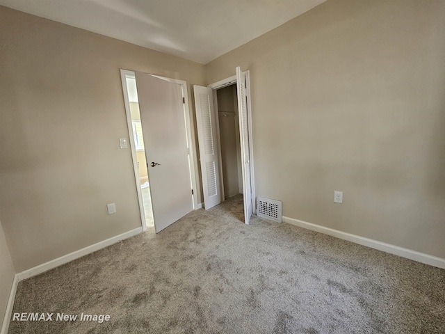 3705 Gratiot Ave, Flint, MI 48503 - unfurnished bedroom with carpet flooring and a closet
