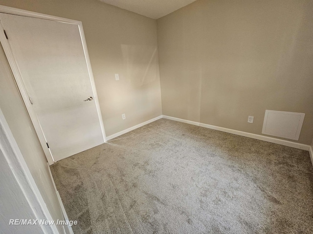 3705 Gratiot Ave, Flint, MI 48503 - spare room with carpet floors and baseboards