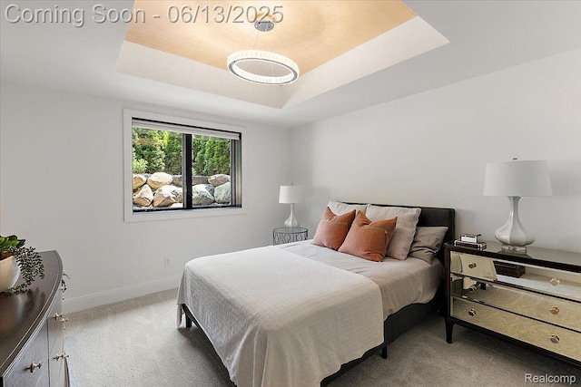 212 Enclave Ct, Rochester Hills, MI 48306 - carpeted bedroom featuring a raised ceiling and baseboards