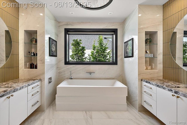 212 Enclave Ct, Rochester Hills, MI 48306 - bathroom with tile walls, a garden tub, vanity, and marble finish floors
