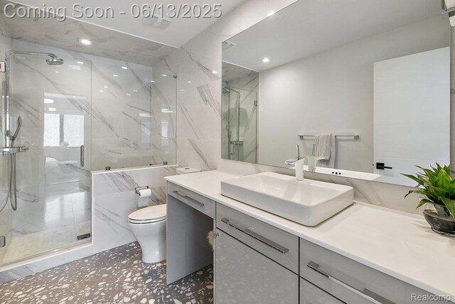 212 Enclave Ct, Rochester Hills, MI 48306 - full bathroom with vanity, a marble finish shower, and tile walls