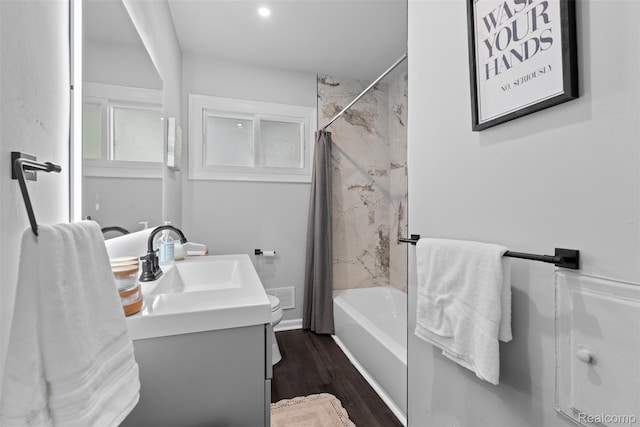 30112 Matthew St, Westland, MI 48186 - bathroom featuring vanity, toilet, shower / tub combo with curtain, and wood finished floors
